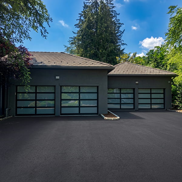 Stunning residential garage door installed on a beautiful family home