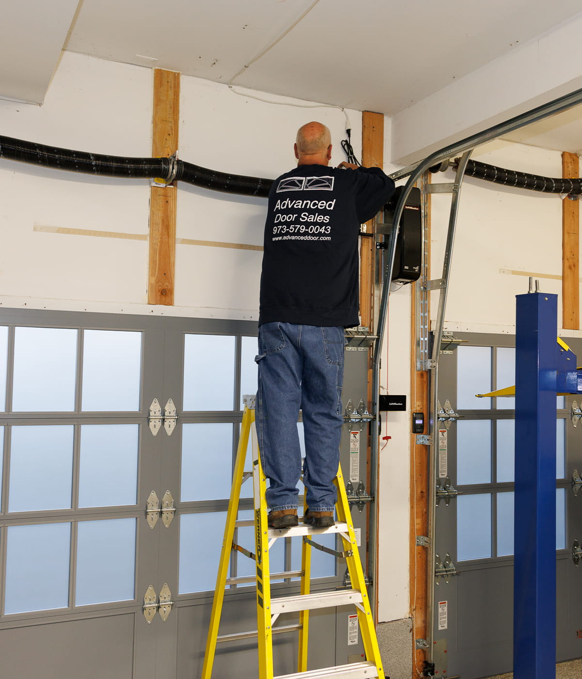 Residential garage door installation on a Jersey City, NJ home by Advanced Door Sales