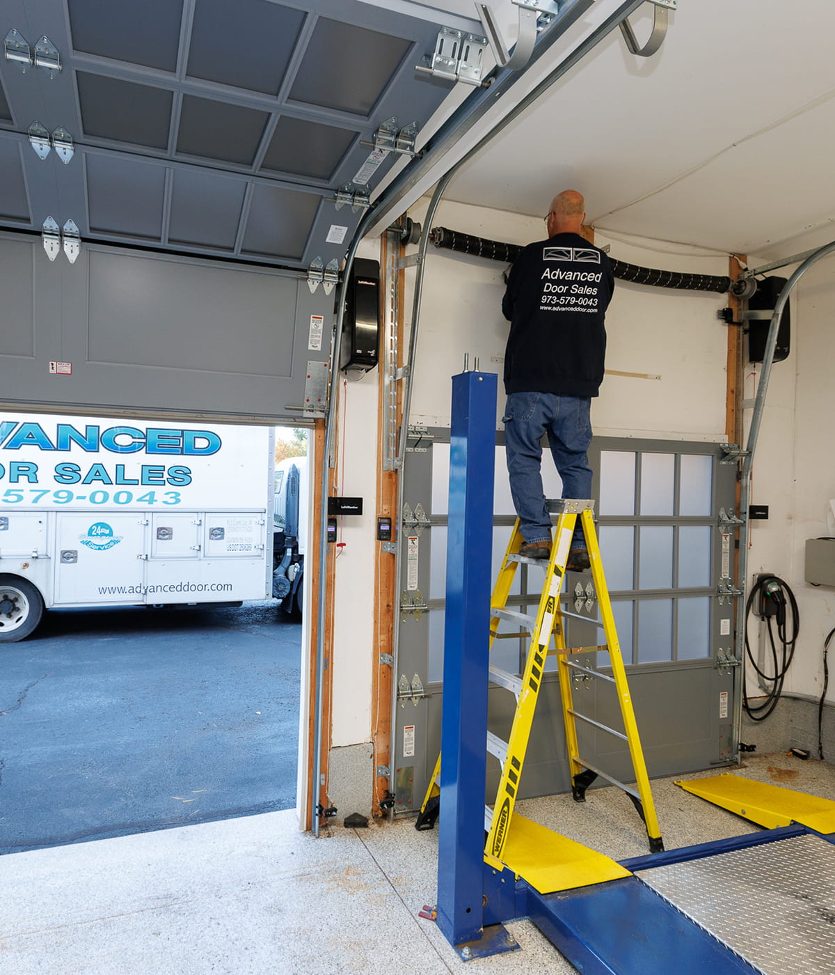 Residential garage door installation on a NYC, NY home by Advanced Door Sales