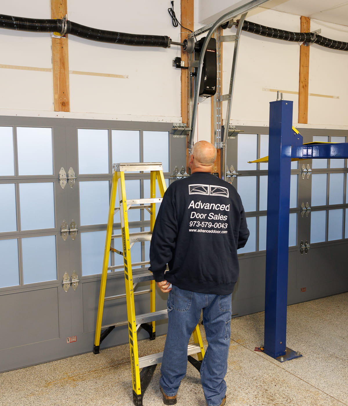 Residential garage door installation on a Queens, NY home by Advanced Door Sales