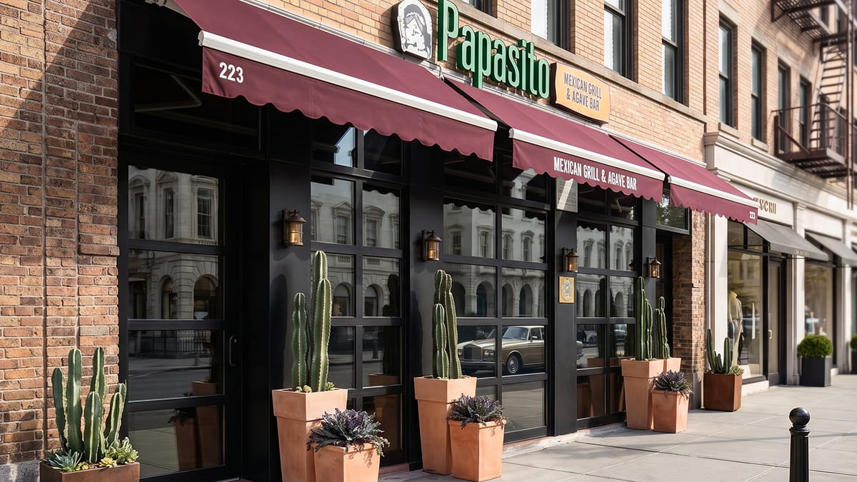restaurant glass garage doors installed for indoor outdoor dining space